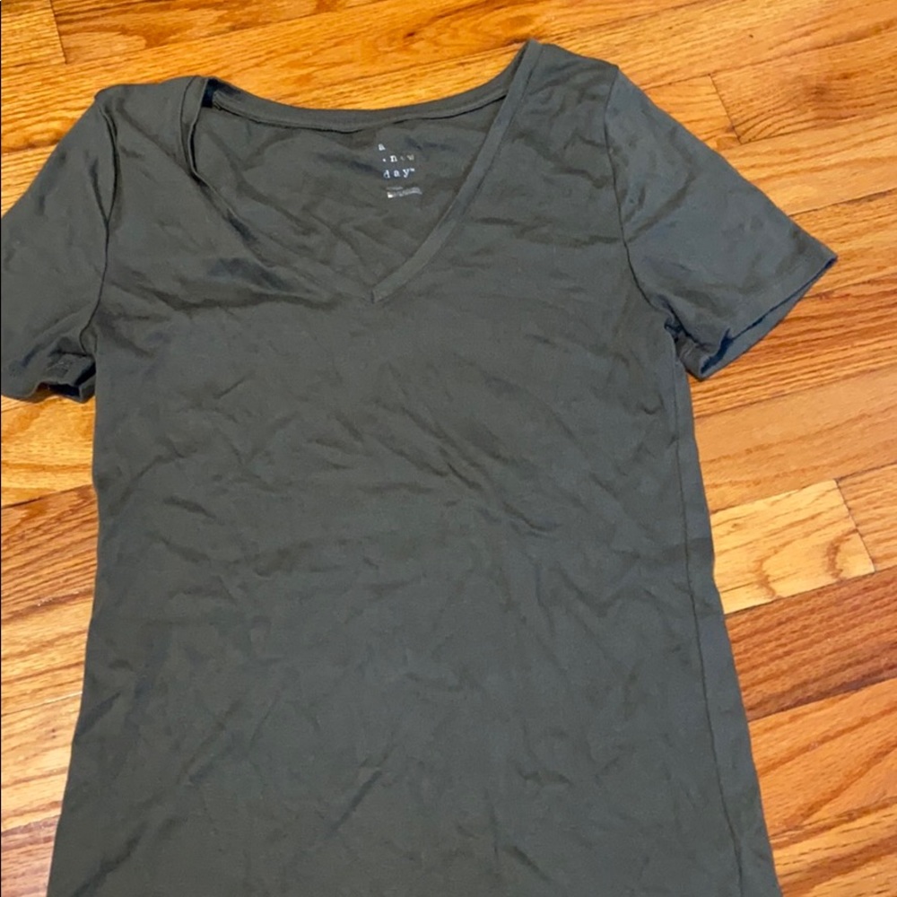 Hunter green shirt.